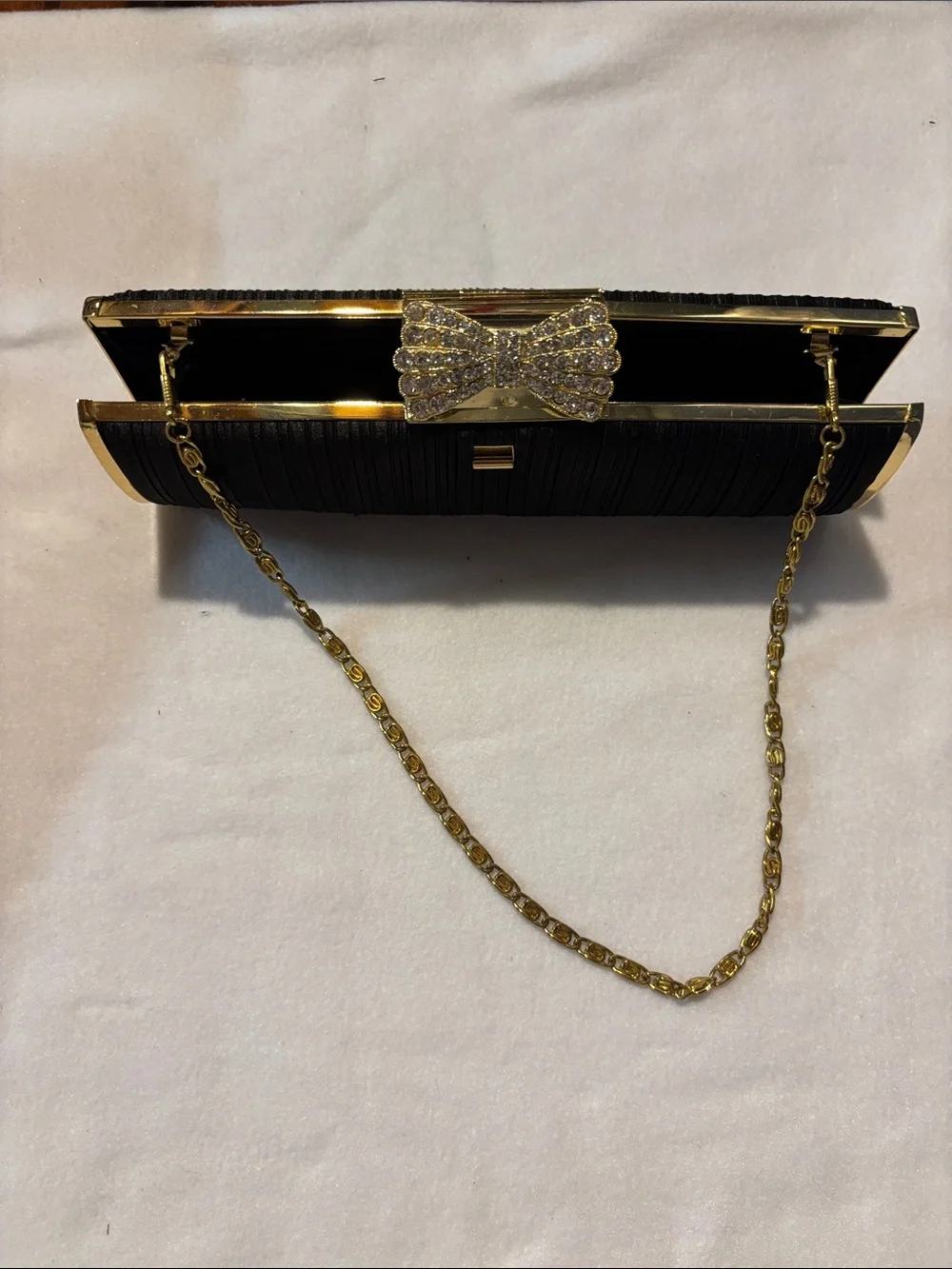Black Evening Clutch with Gold Chain and Bow Accent